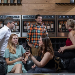 Groups of people relaxing at the Wine Bar at Copia